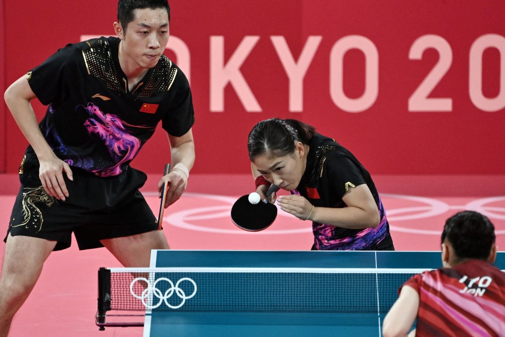 英格兰队轻取日本队，许昕带队取胜